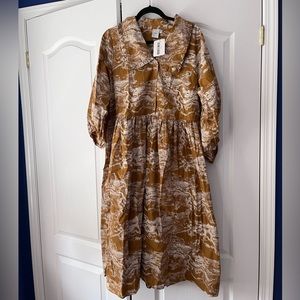 ICHI mustard dress with cloud print, puff sleeves and oversized collar.